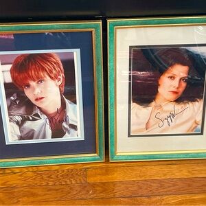 Framed autographed headshots of Sigourney Weaver and Jennifer Jason Leigh set.